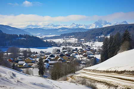 山麓雪景下的乡村风光背景