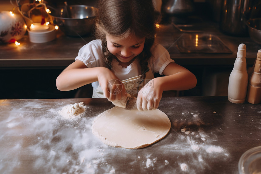 厨房中烘焙面包的小女孩图片