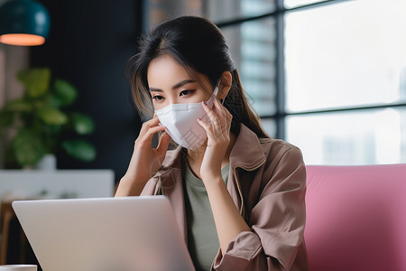 戴着口罩办公的年轻女孩背景图片