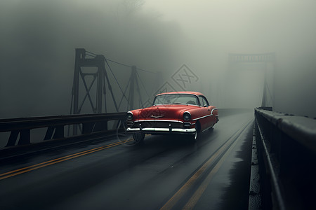 红车穿过迷雾缭绕的吊桥背景图片