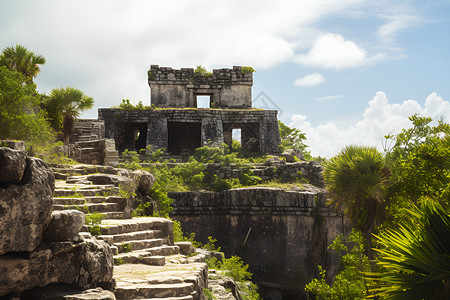 悬崖上的石制建筑玛雅遗址背景图片