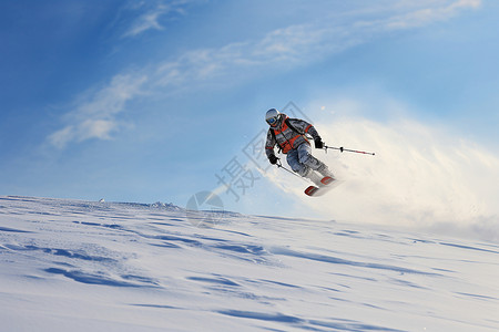 阳光下滑雪的人背景图片