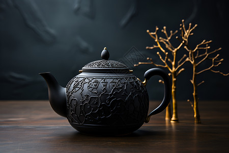 木桌上的精美茶壶背景图片