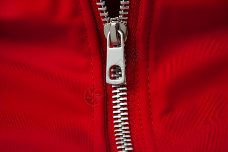 红色外套上的金属拉链高清图片