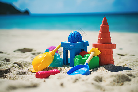 沙滩玩具海滩上的塑料玩具背景