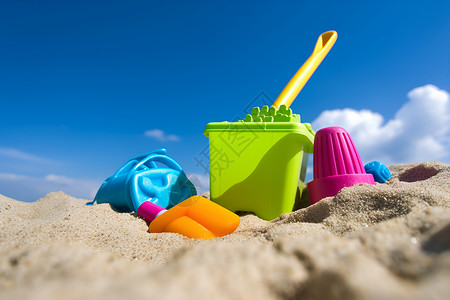 沙滩上的儿童玩具背景图片