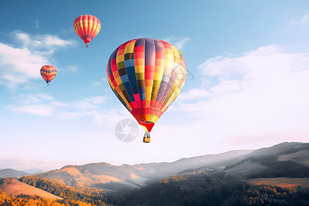 翱翔山巅的热气球群背景图片