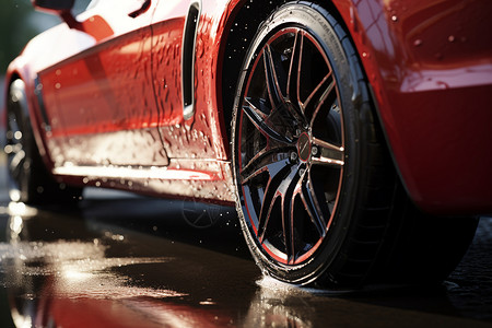 红色汽车雨天打滑的高清图片