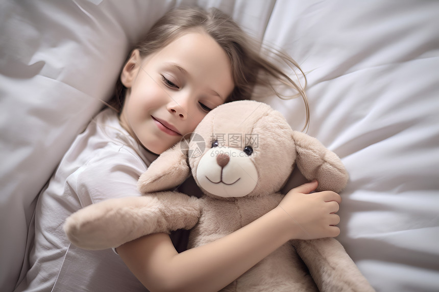 女孩和泰迪熊在床上睡觉图片