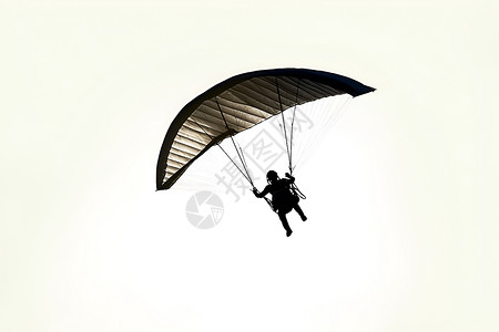 降落伞在空中背景图片