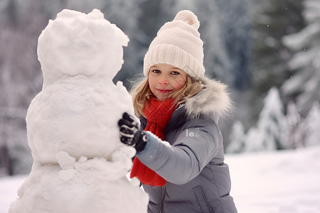 冬天堆雪人的女孩雪地玩乐的孩子背景