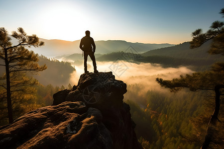 户外登上登上山顶的男人背景