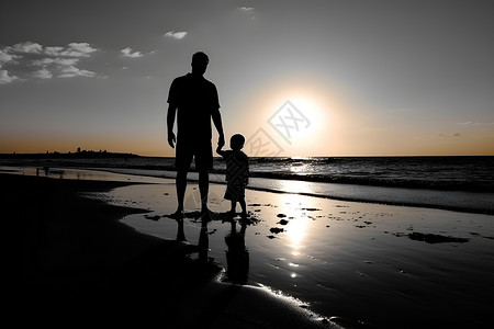 沙滩上的父子背景图片