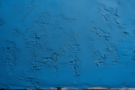 粗糙的蓝墙背景图片