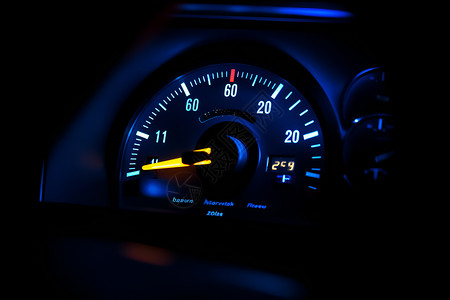 蓝光闪烁夜晚发光的汽车仪表盘背景