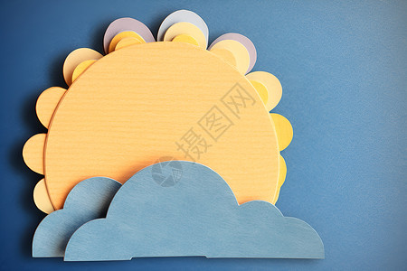 设计的太阳云彩剪纸背景图片