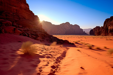 夕阳下的沙漠奇景背景图片