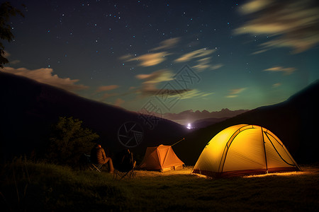 夜晚户外的露营帐篷背景图片