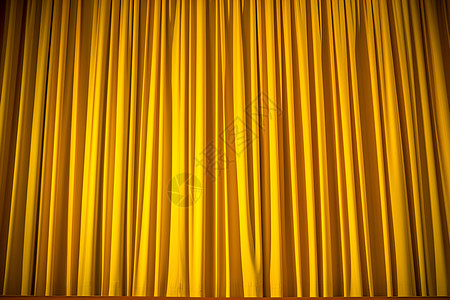 剧院舞台金黄色的帷幕设计图片