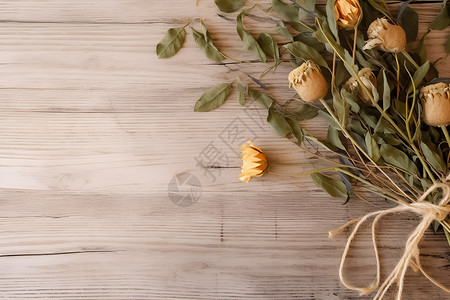 麻绳装饰木桌上的一束鲜花背景
