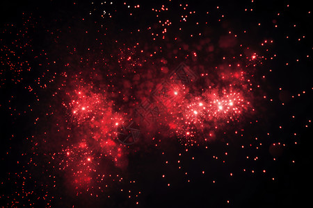 星空中一个红色的烟花背景图片