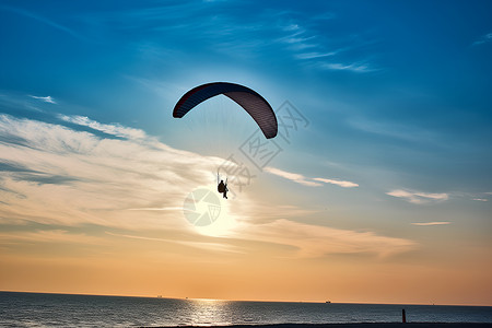 日暮时分一个滑翔伞高清图片