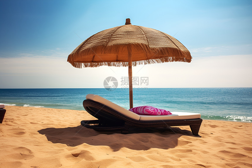 伞底下的沙滩椅图片