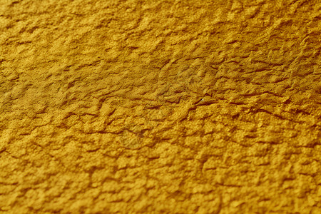 金黄色纹理的橡胶背景背景图片