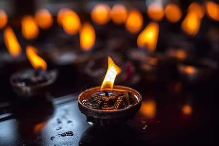 传统祭祀节日点燃的蜡烛烛光背景