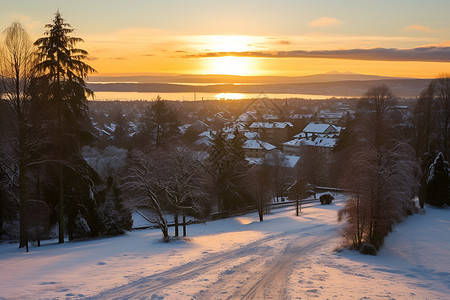 雪地小镇的夕阳背景图片
