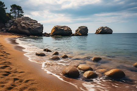 沙滩岩石间的水景背景图片