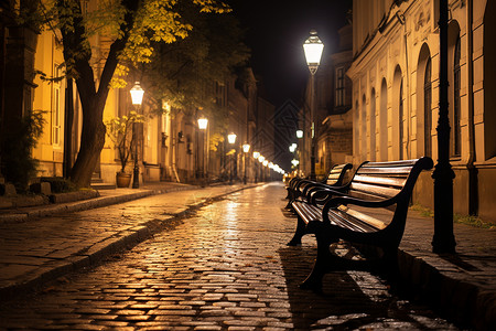 夜晚街道中的长椅背景图片