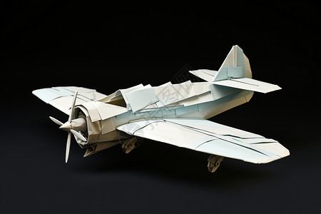 制作飞机素材桌面上的纸质飞机模型设计图片