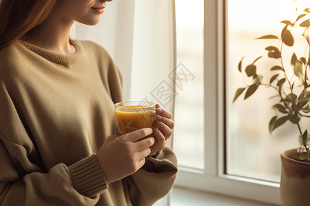 品尝咖啡的女子背景图片