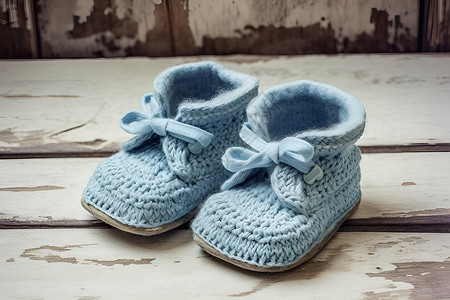 褪色的蓝色宝宝鞋背景图片