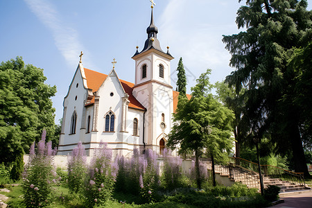 花海中的乡村教堂背景图片