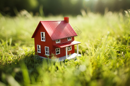 草坪上的房屋模型背景图片