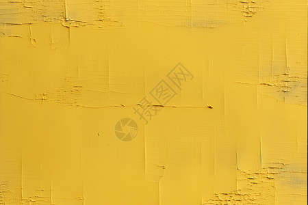 黄色墙壁上的油漆背景图片