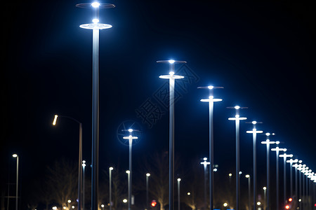 城市夜晚的一排街灯背景图片