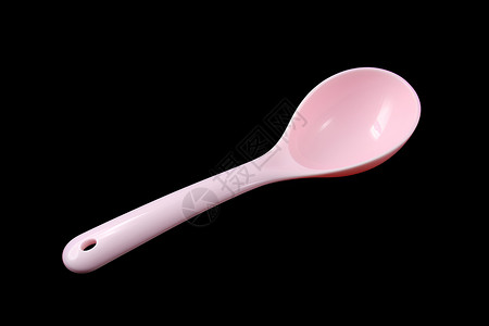 粉色的勺子背景图片