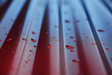红色水滴金属结构上的水滴背景