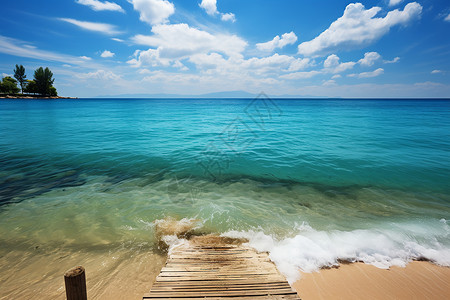 碧海蓝天的沙滩木栈道背景图片