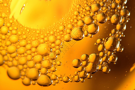 美味啤酒的黄色泡沫背景图片