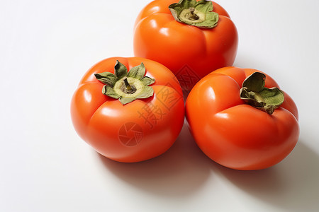 新鲜熟透的柿子背景图片