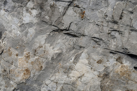 粗糙的岩石峭壁背景图片