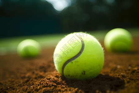 泥土中的网球背景图片