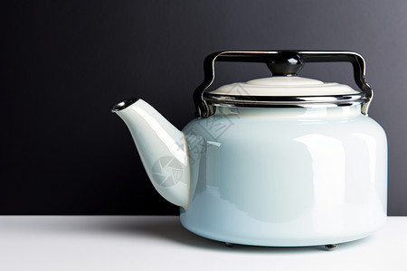 白色的茶壶烧水壶金属壶高清图片