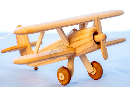 木头的飞机玩具背景图片