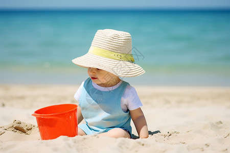 沙滩乐趣宝宝趴在沙滩上高清图片