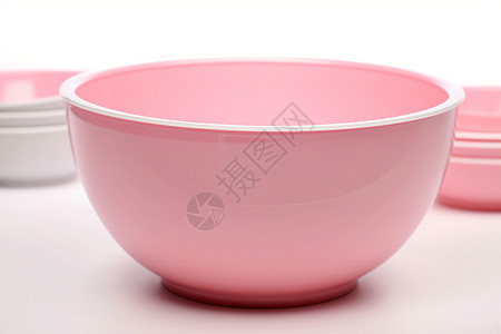 粉色的塑料碗背景图片